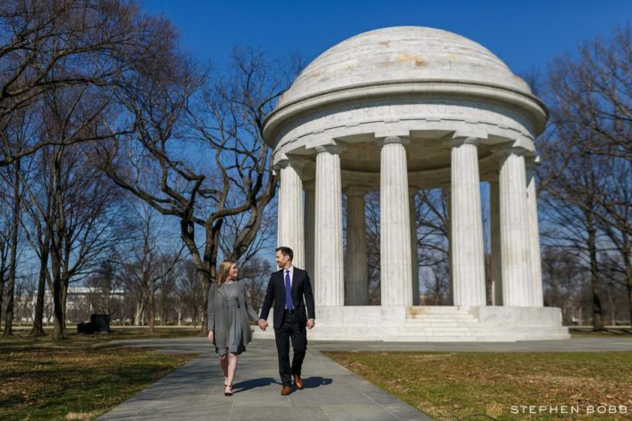 Wedding couple walking by DC War Memorial