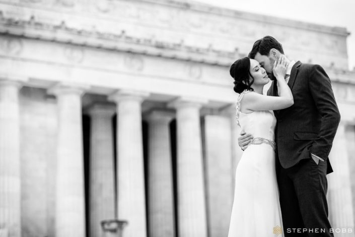 Black and white portrait of wedding couple at Lincoln Memorial